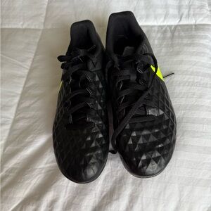 Black and Yellow Nike Tiempo soccer cleats